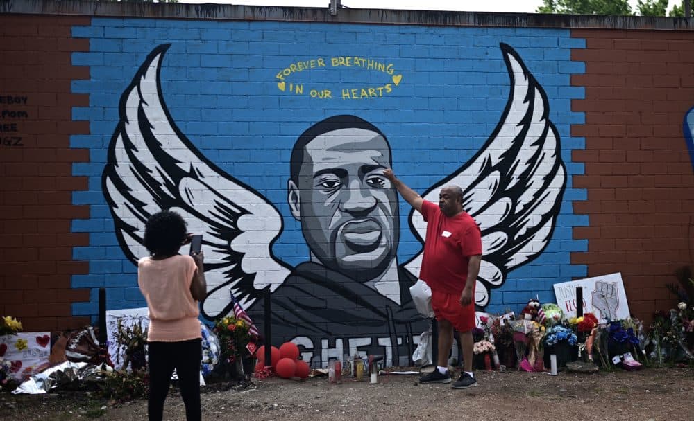 People visit a makeshift memorial for George Floyd placed in his former neighborhood, the Third Ward, in Houston, Texas. (Johannes Eisele EISELE/AFP via Getty Images)
