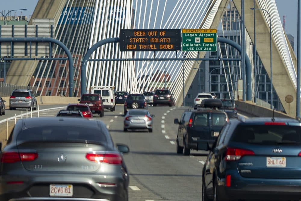 New signage on the Zakim Bridge echo the travel order goes into effect on Aug. 1. (Jesse Costa/WBUR)