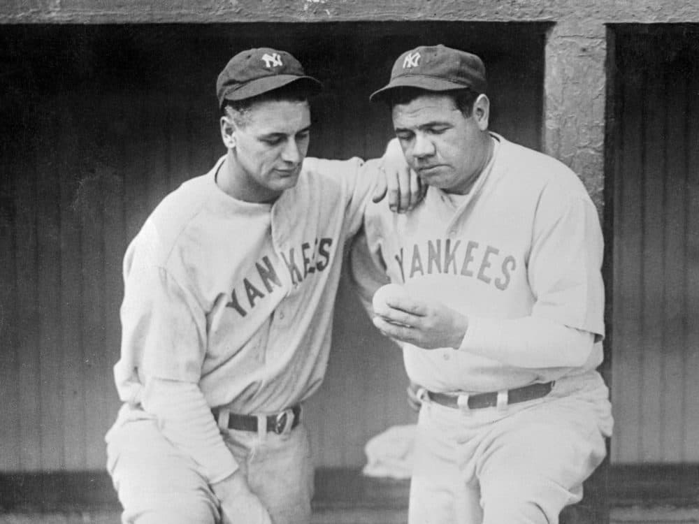 Babe Ruth (right) and Lou Gehrig (left) look at the ball which flew over the left field wall of Dunn field in Cleveland Ohio for the Babe's 500th home run of his baseball career. (Bettmann Archive/Getty Images)