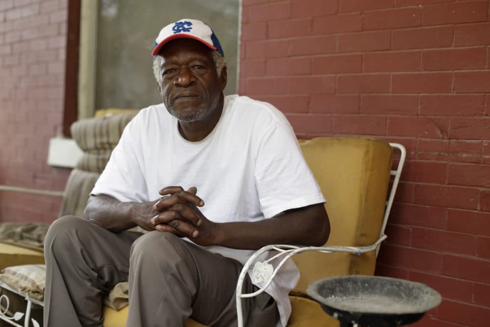 Gerald Armstrong recalls his time working for the old Kansas City Athletics as an attendant and ball boy in the visitor's clubhouse as he speaks from the front porch of the home where he grew up and now lives in Kansas City, Mo., on Friday, June 26, 2020. Armstrong is one of more than a dozen Black men who said they were sexually molested by former Red Sox clubhouse manager Donald &quot;Fitzy&quot; Fitzpatrick when they were youths. (AP Photo/Charlie Riedel)