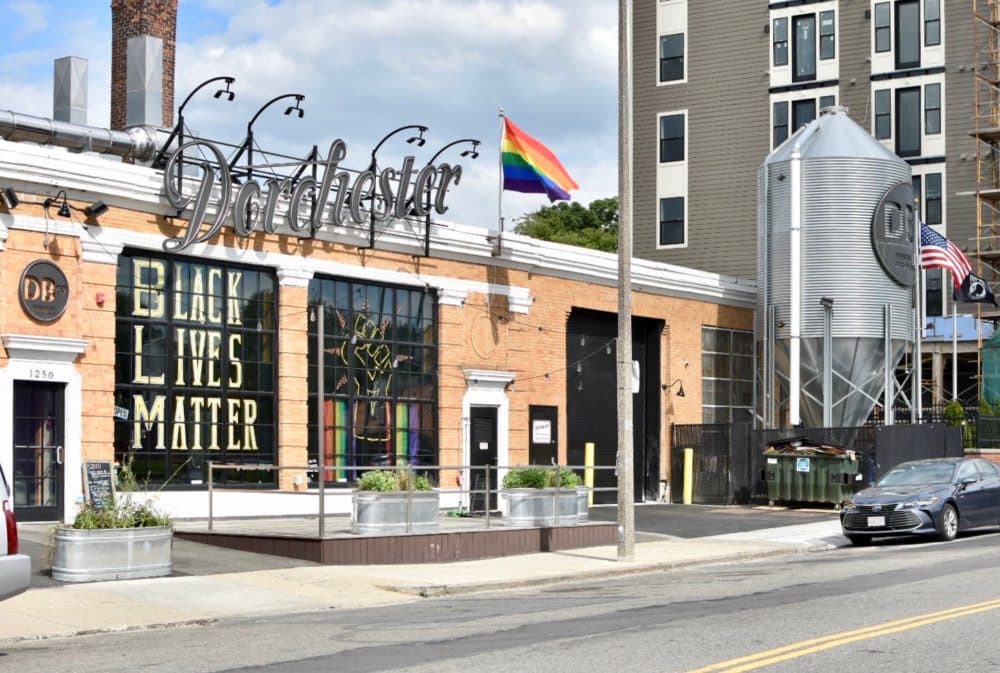 The front windows of Dorchester Brewing Company display a Black Lives Matter sign and fist. (Courtesy Dorchester Brewing Company)