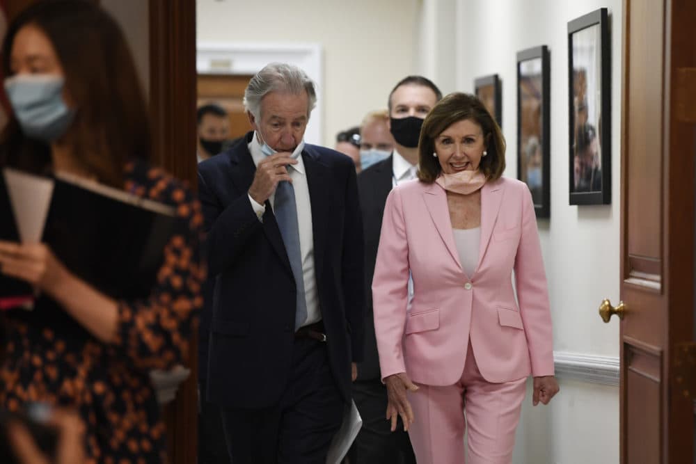 House Speaker Nancy Pelosi and Rep. Richard Neal arrive for an event on the Moving Forward Act, Thursday, June 18, Washington. (AP Photo/Susan Walsh)