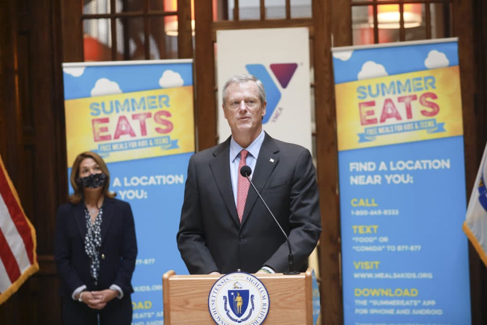 Massachusetts Gov. Charlie Baker takes to the podium as he visits the YMCA of Greater Boston to discuss collaborative efforts to combat food insecurities resulting from the COVID-19 pandemic in Boston on July 1. (Nicolaus Czarnecki/MediaNews Group/Boston Herald via pool)
