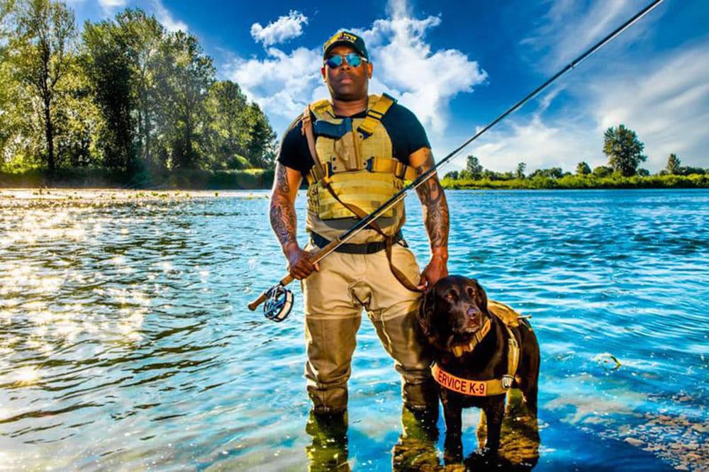 Chad Brown with his dog Axe on the Willamette River, Oregon. (Courtesy of Chad Brown)