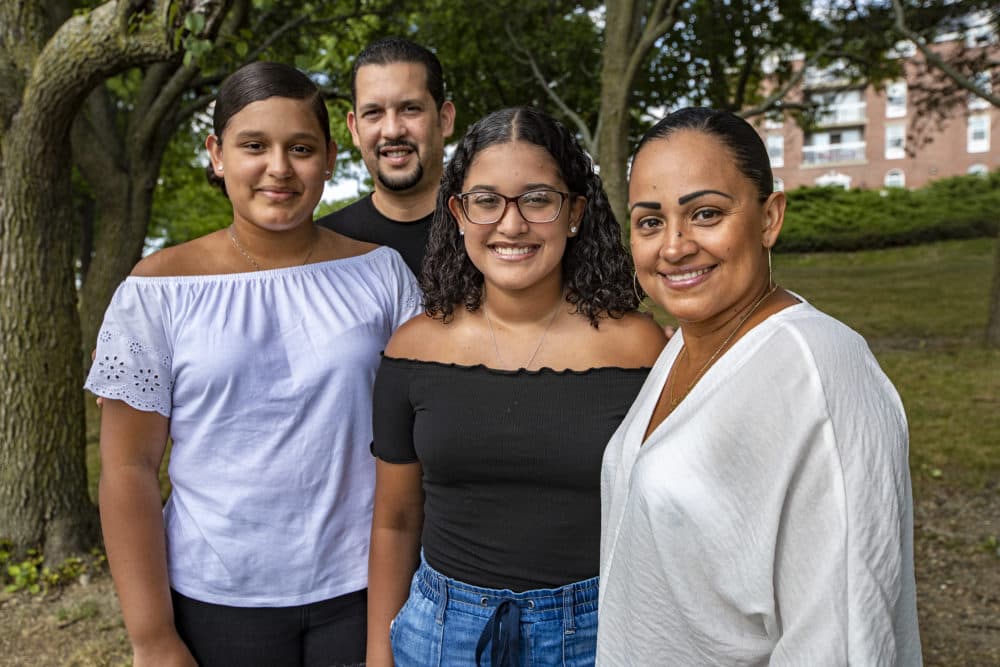 Jessica Armijo Sabillon, right, with her family at O'Malley State Park in Chelsea. (L-R) Daughter Michelle, 13, her husband Reymer and daughter Adriana, 17. (Jesse Costa/WBUR)