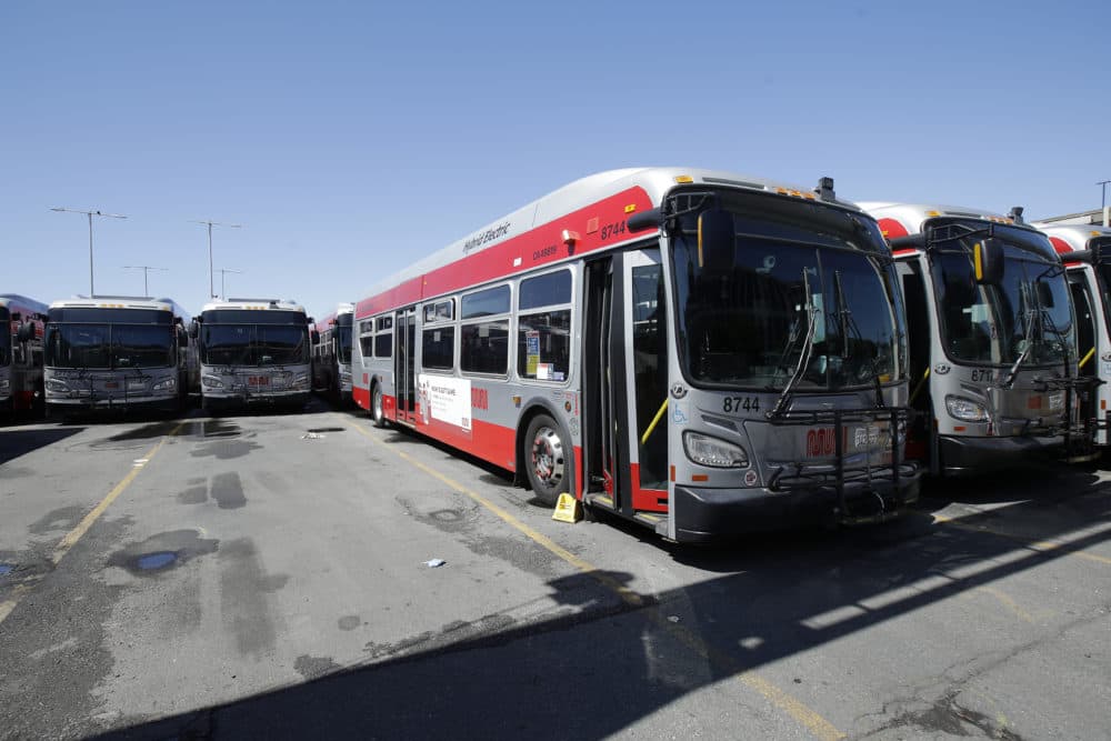 Muni buses are shown at a San Francisco Municipal Transportation Agency yard in San Francisco, Tuesday, April 7, 2020. (Jeff Chiu/AP)