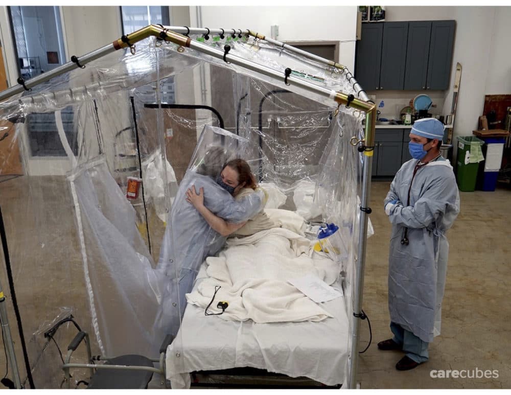 Hugging a patient using the Care Cube. (Courtesy of Toyota Research Institute and Otherlab)