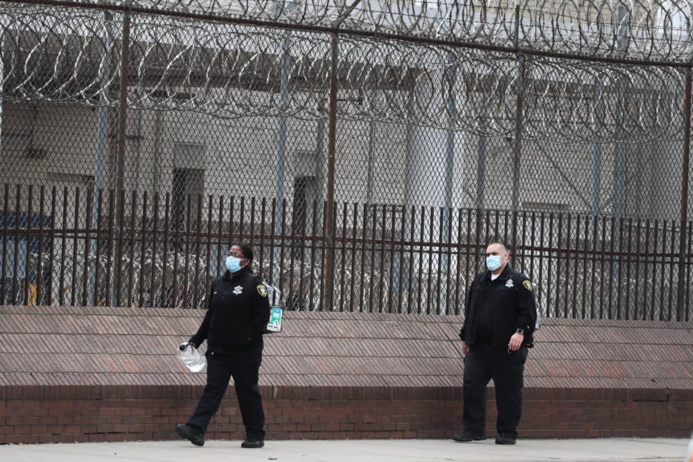People wearing protective masks leave the Cook County jail complex on April 09, 2020 in Chicago, Illinois. (Scott Olson/Getty Images)