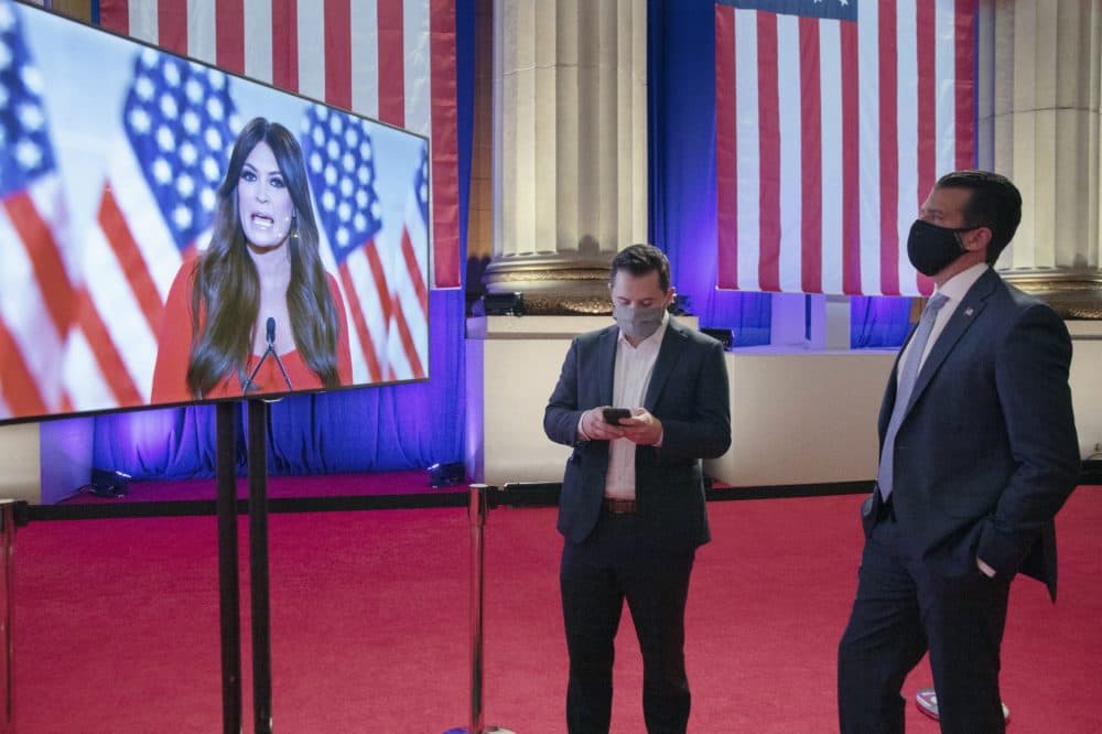 Donald Trump Jr. (R) watches his girlfriend Kimberly Guilfoyle as she pre-records her address to the Republican National Convention at the Mellon Auditorium on August 24, 2020 in Washington, DC. The COVID-19 pandemic has forced the Republican Party to move away from an in-person convention to a televised format, similar to the Democratic Party's convention a week earlier. (Chip Somodevilla/Getty Images)
