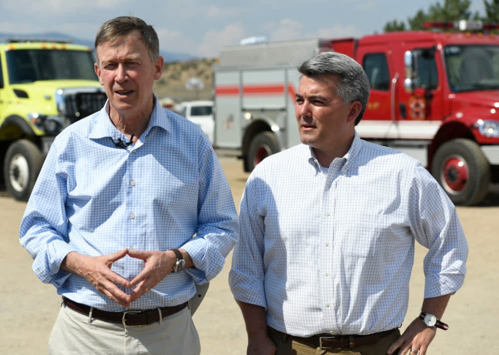 John Hickenlooper (left) and Cory Gardner discuss the Spring Fire during a press conference in 2018. (Andy Cross/The Denver Post via Getty Images)