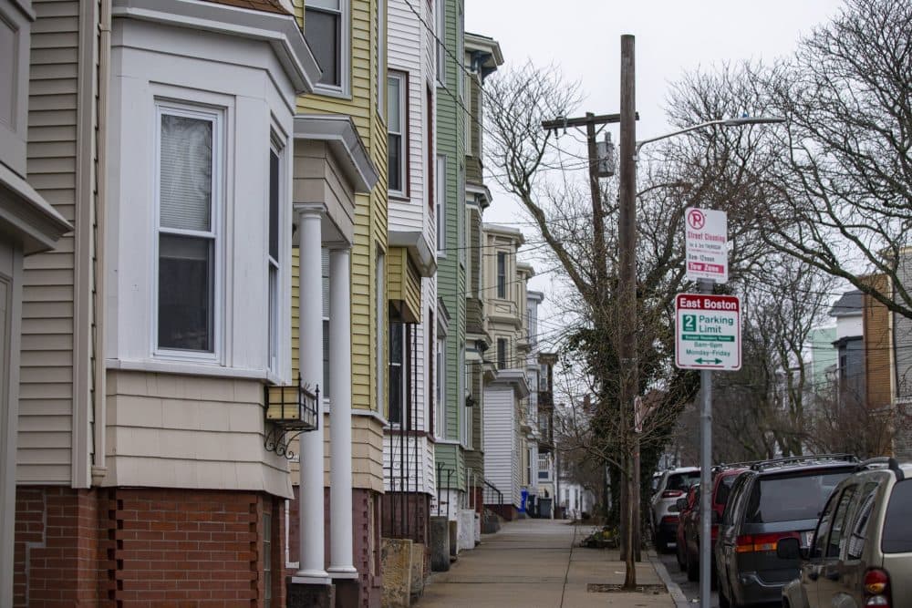 Triple and double decker apartments in McCormack Square in East Boston. (Jesse Costa/WBUR)