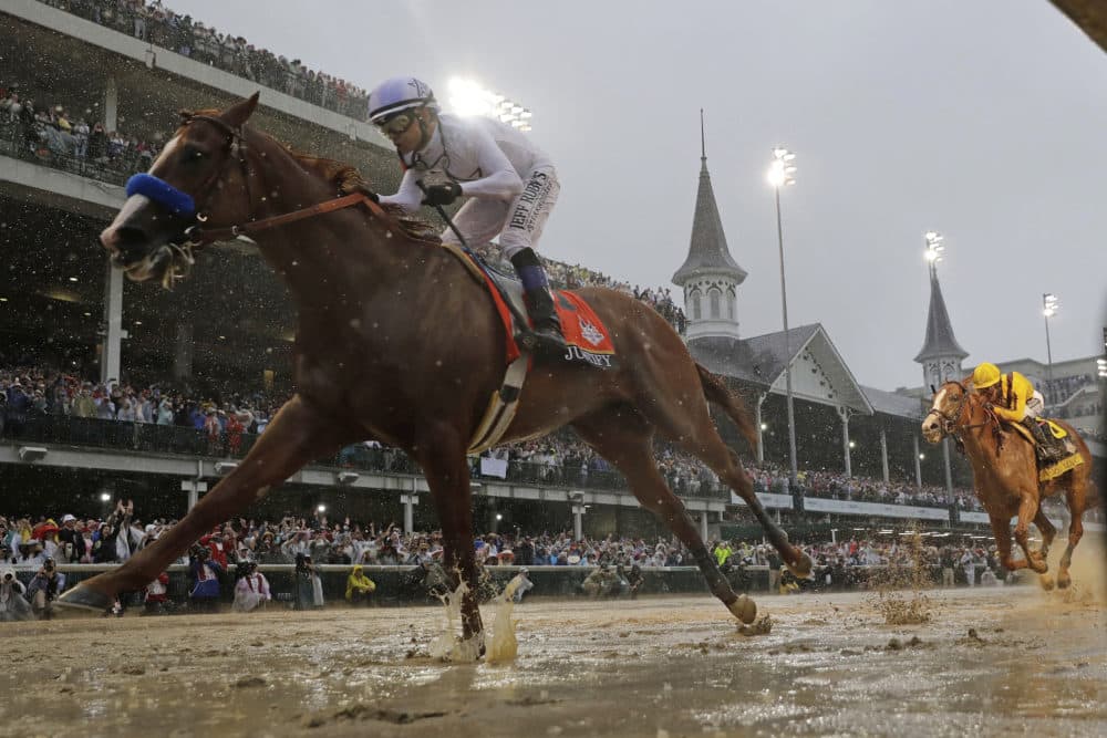 In this May 5, 2018, file photo, Mike Smith rides Justify to victory during the Kentucky Derby horse race in Louisville. The move of the Triple Crown’s first leg to Labor Day weekend due to the coronavirus pandemic will mark the first time the Derby won’t run on the first Saturday in May since 1945. (Morry Gash/AP)