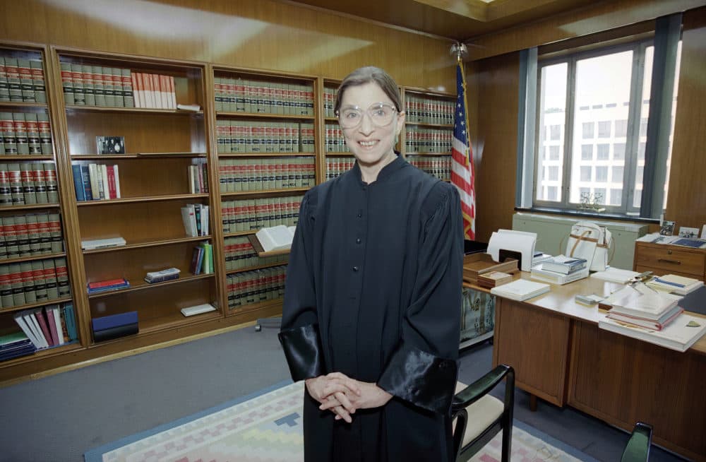 Judge Ruth Bader Ginsburg poses in her robe in her office at U.S. District Court in Washington on Aug. 3, 1993. Earlier, the Senate voted 96-3 to confirm Bader as the 107th justice and the second woman to serve on the Supreme Court. (Doug Mills/AP)