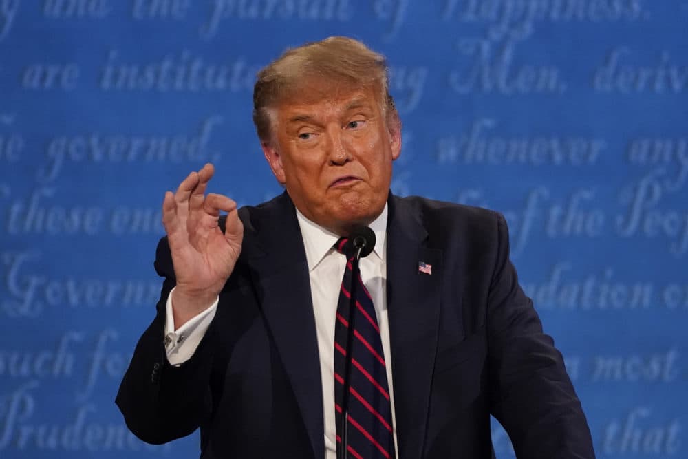 President Trump gestures while speaking during the first presidential debate Tuesday in Cleveland. (Julio Cortez/AP)