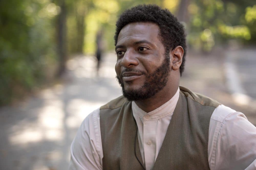 Actor Kadahj Bennett, who performs all the characters in &quot;The Charles W. Lenox Experience.&quot; (Robin Lubbock/WBUR)