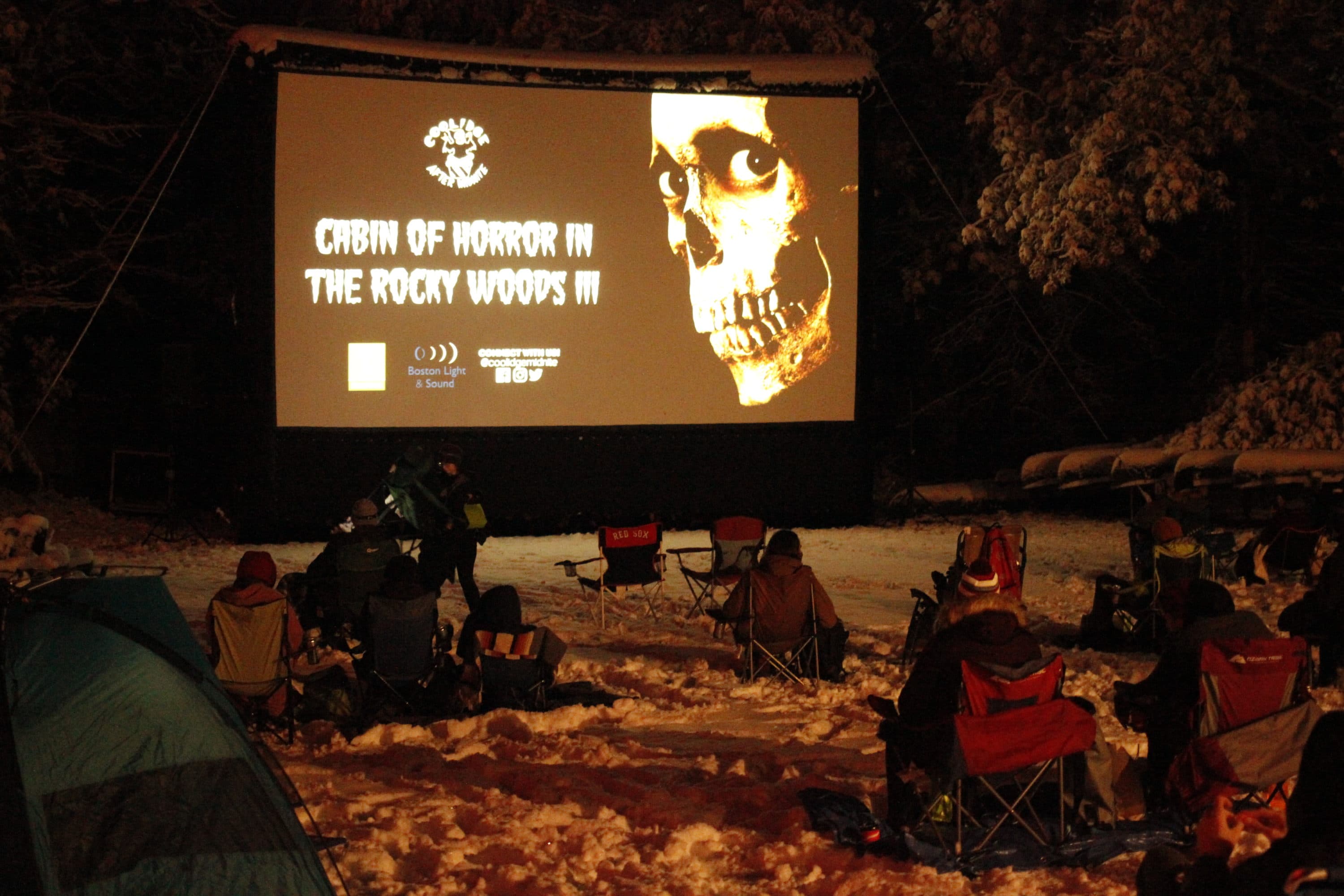 Campers watched horror films curated by the Coolidge Corner Theater in the snow. (Jenn Stanley/WBUR)