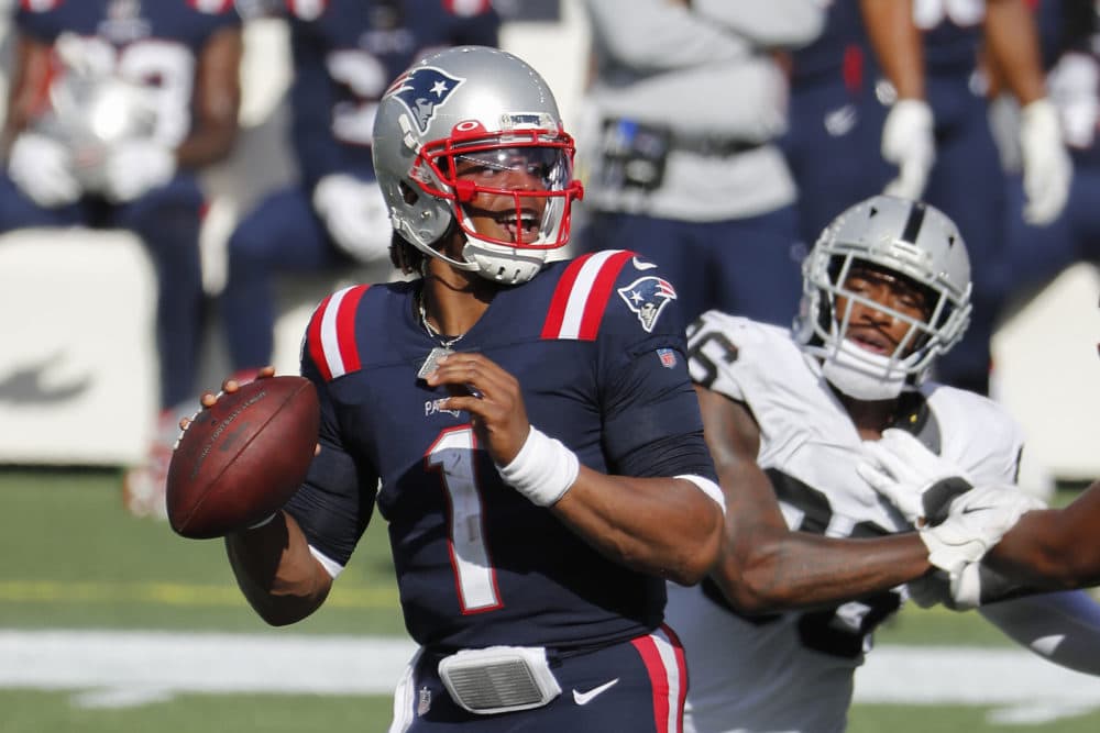 New England Patriots quarterback Cam Newton looks to pass against the Las Vegas Raiders during an NFL football game at Gillette Stadium, Sunday, Sept. 27, 2020 in Foxborough, Mass. (Winslow Townson/AP)