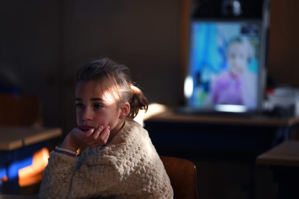 An elementary student following online lessons from home on May 15, 2020 in Sint-Marten-Latem, Belgium. (Tim de Waele/Getty Images)