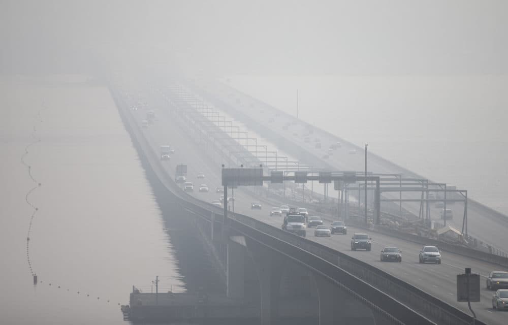 The I-90 bridge over Lake Washington disappears through heavy smoke from wildfires on Sept. 11, 2020 in Seattle, Washington. (Lindsey Wasson/Getty Images)