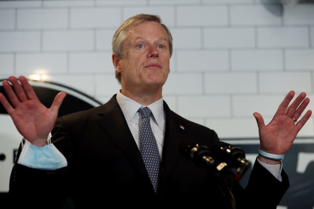 Gov. Charlie Baker takes questions from the media at Mill City BBQ and Brew in Lowell, Sept. 23, 2020. (Craig F. Walker/The Boston Globe via Getty Images)