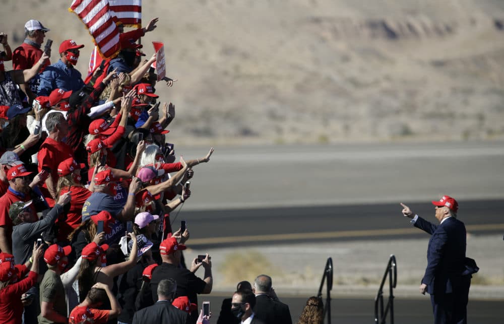 President Donald Trump gestures to supporters following a campaign rally on October 28, 2020 in Bullhead City, Arizona. With less than a week until Election Day, Trump and Democratic presidential nominee Joe Biden are campaigning across the country. (Isaac Brekken/Getty Images)