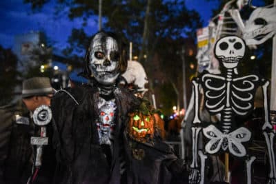 People in costumes participate in the annual Village Halloween parade on Sixth Avenue on Oct. 31, 2018 in New York City. (Stephanie Keith/Getty Images)