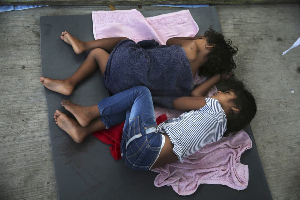 In this July 17, 2019, file photo, migrant children sleep on a mattress on the floor of the AMAR migrant shelter in Nuevo Laredo, Mexico. (Marco Ugarte/AP)