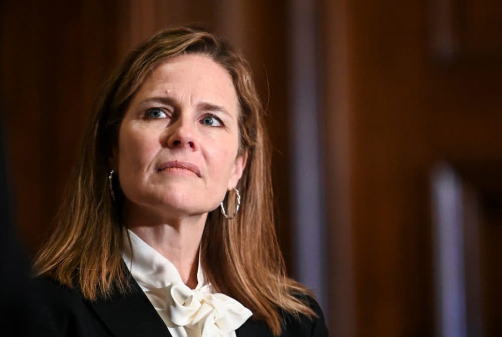 Judge Amy Coney Barrett, President Trump's nominee for the U.S. Supreme Court, looks on during a meeting with Sen. Kevin Cramer (R-ND) on Capitol Hill in Washington, D.C. on Oct. 1, 2020. (Erin Scott / Pool / AFP via Getty Images)