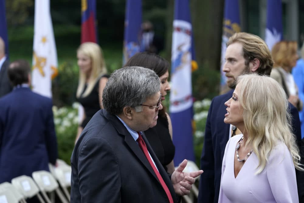 Attorney General William Barr speaks with Kellyanne Conway after President Trump announced Judge Amy Coney Barrett as his nominee to the Supreme Court, in the Rose Garden at the White House on Sept. 26. (Alex Brandon/AP)