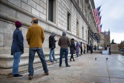 Voters line up to vote at the Boston Public Library on Election Day 2020. (Robin Lubbock/WBUR)