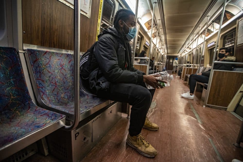 Josh Knight commutes on the Orange Line — and a bus and shuttle — to the Charlestown YMCA. (Jesse Costa/WBUR)