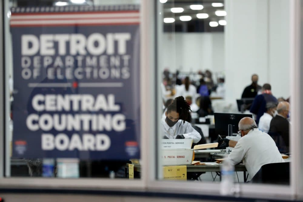 Detroit election workers work on counting absentee ballots for the 2020 general election at TCF Center on November 4, 2020 in Detroit, Michigan. (Jeff Kowalsky/AFP via Getty Images)