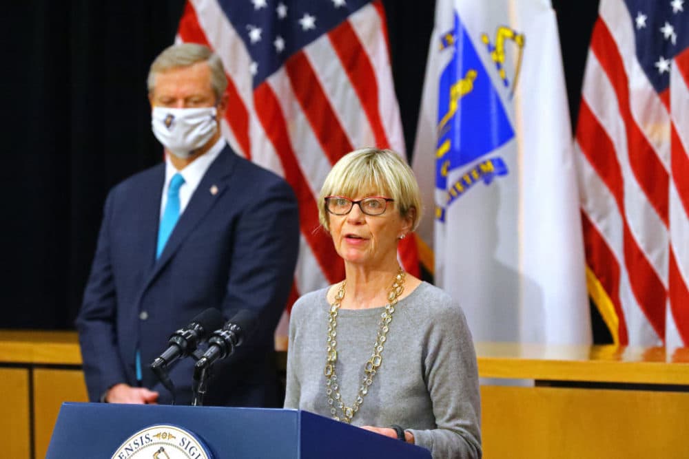 Secretary of Health and Human Services Marylou Sudders, along with Gov. Charlie Baker, during a press conference at the Massachusetts State House in Boston on Nov. 18, 2020. (Photo by Pat Greenhouse/The Boston Globe via Getty Images)