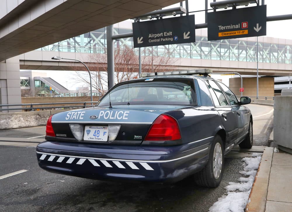 A Massachusetts State Police Troop F car sits parked in front of Terminal A at Logan Airport in Boston on March 23, 2018. (John Tlumacki/The Boston Globe via Getty Images)