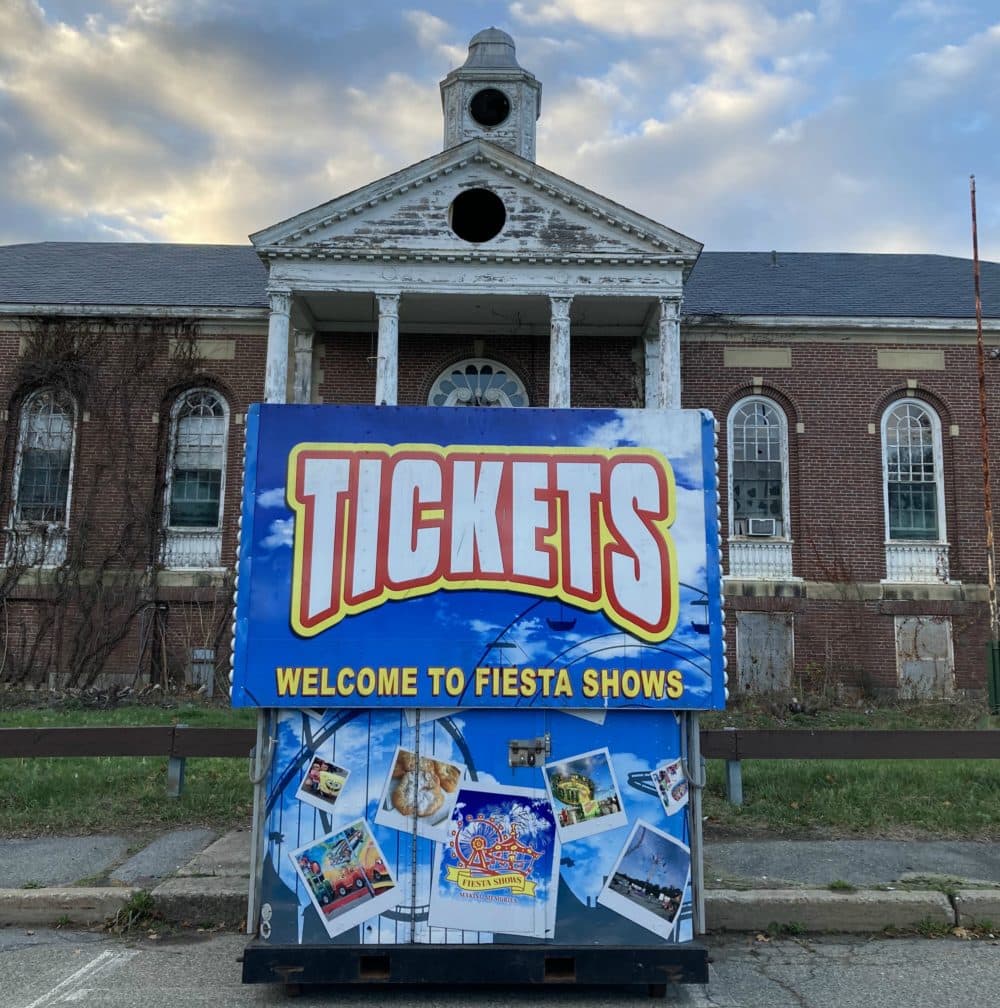 A ticket booth for a Lions Club fundraiser in front of the vandalized administration building of the Walter E. Fernald Developmental Center in Waltham. (Courtesy)
