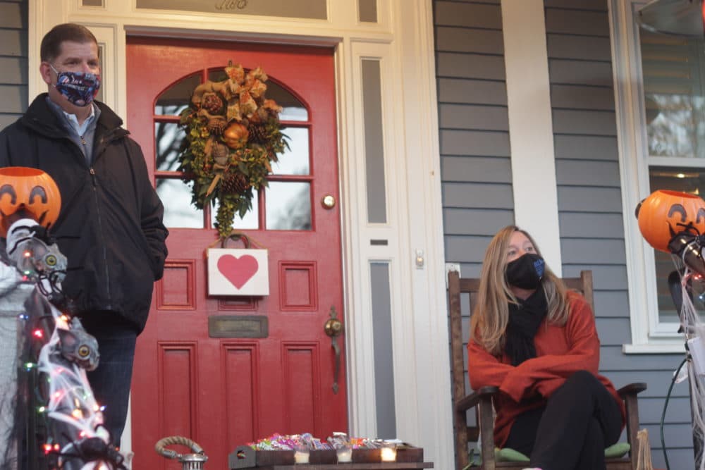 Boston Mayor Marty Walsh and his longtime girlfriend, Lorie Higgins, wait for trick-or-treaters at their Lower Mills, Dorchester, home. (Quincy Walters/WBUR)