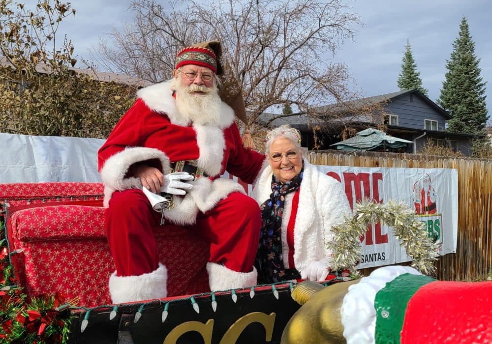 Tom Carmody as Santa this year. During the coronavirus pandemic, he's been sitting on a trailer that his elf friend tows him around on so he can wave hello to the kids at a safe distance. (Courtesy)