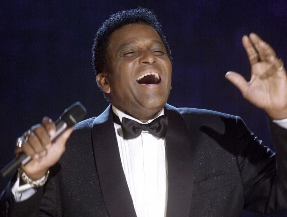 In this Oct. 4, 2000, photo, Charlie Pride performs during his induction into the Country Music Hall of Fame at the Country Music Association Awards show at the Grand Ole Opry House in Nashville, Tenn. Pride, the son of sharecroppers in Mississippi and became one of country music’s biggest stars and the first Black member of the Country Music Hall of Fame, has died at age 86. (Charlie Neibergall/AP)