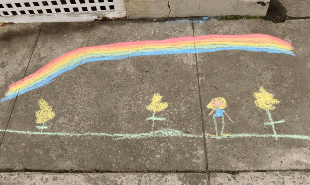A chalk drawing by Abigail Fichthorn, 8, and her mother Jeanni Fichthorn, outside their home on Penn Ave in Wernersville, Penn. on March 24, 2020. (Ben Hasty/MediaNews Group/Reading Eagle via Getty Images)
