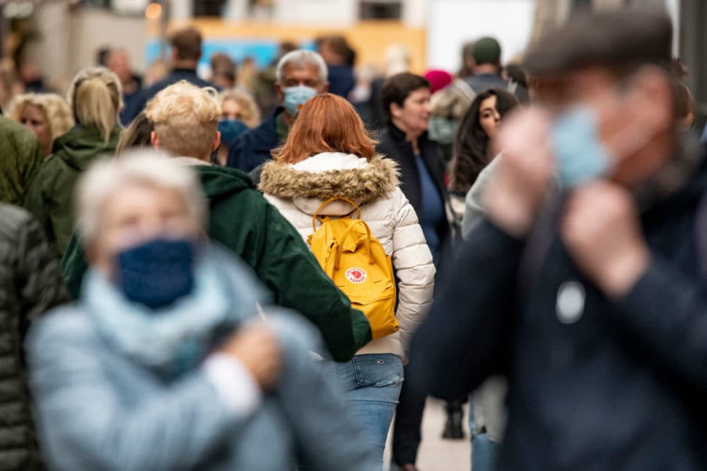 People walk through the pedestrian zone on Spitalerstraße in Hamburg, Germany(Axel Heimken/Picture Alliance via Getty Images)