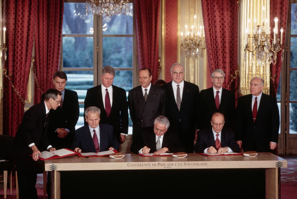 Leaders of six other nations look on as the presidents of Serbia, Croatia and Bosnia sign the Dayton Accords at the Elysee Palace in France. (Peter Turnley/Corbis/VCG via Getty Images)