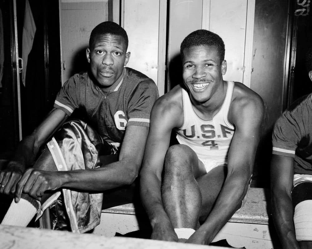 In this March 1, 1956, file photo, K.C. Jones, captain of the University of San Francisco Dons, right, is shown with teammate Bill Russell in San Francisco. (Robert Houston/AP)