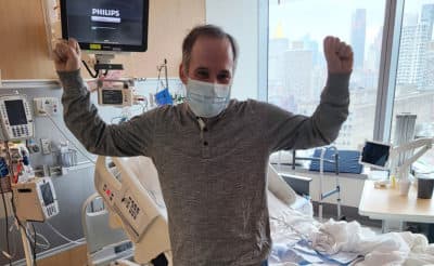Jeff Gerson stands by his hospital bed after he recovering from the coronavirus. (Courtesy)