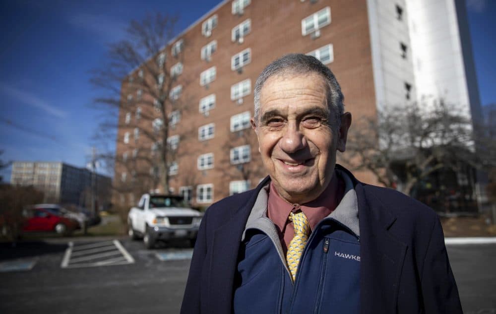 Jerry Halberstadt outside his low-income senior housing building in Peabody. (Robin Lubbock/WBUR)