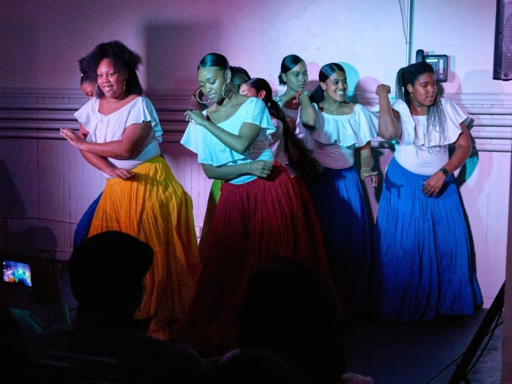 Hyde Square Task Force youth perform an Afro Cuban dance piece during an open mic night in Jamaica Plain in 2019. (Courtesy Mark Saperstein)
