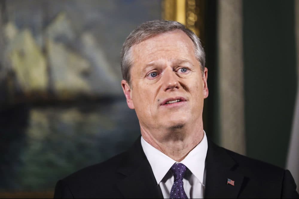 Massachusetts Gov. Charlie Baker delivers his televised State of the Commonwealth address from his ceremonial State House office on Jan. 26, 2021, in Boston. (Erin Clark/The Boston Globe via AP, Pool)
