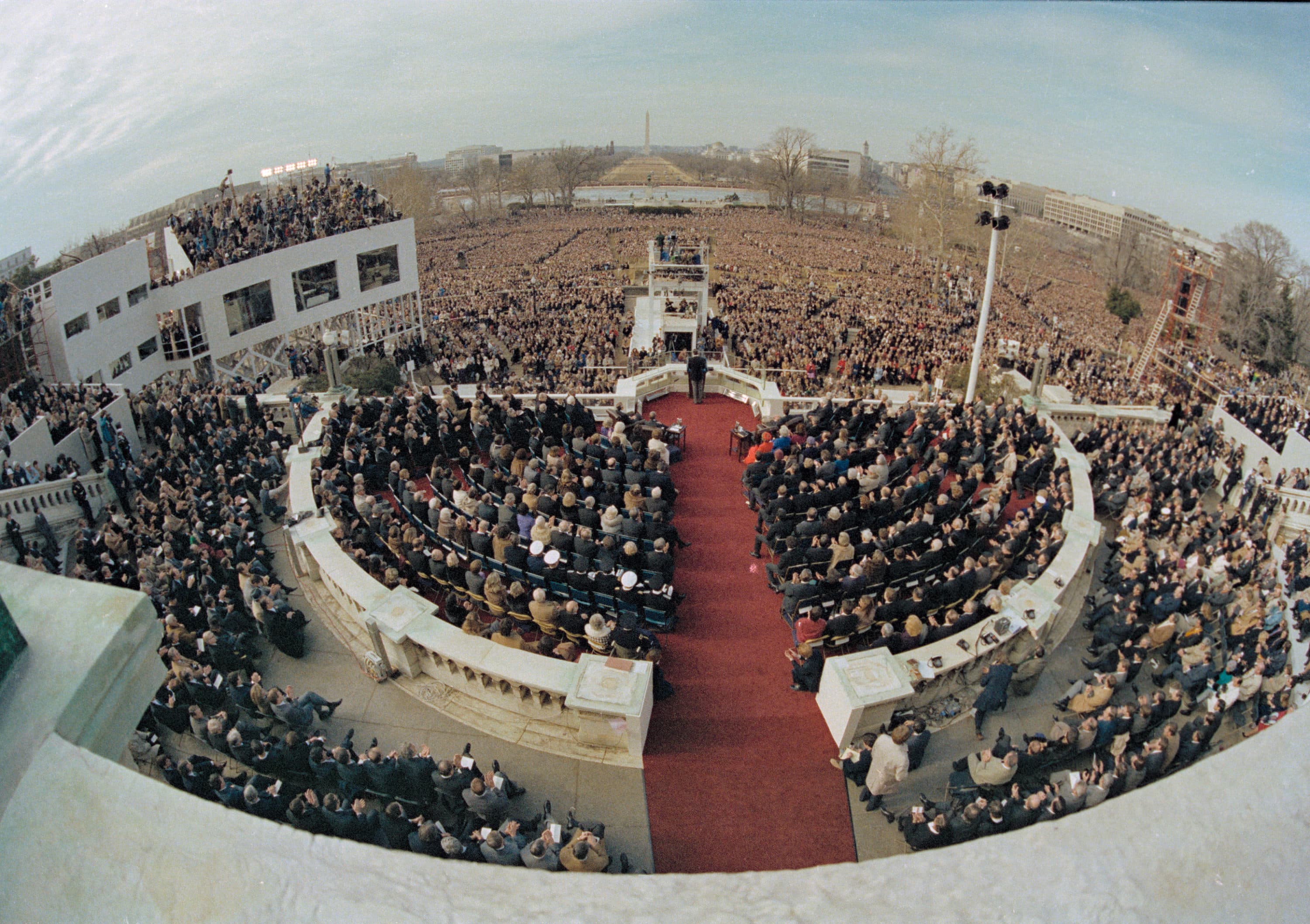 This wide angle view from the Capitol balcony shows U.S. President Ronald Reagan, visible at center, as he addresses the nation following his swearing-in ceremony in Washington, D.C., Jan. 20, 1981. (AP)
