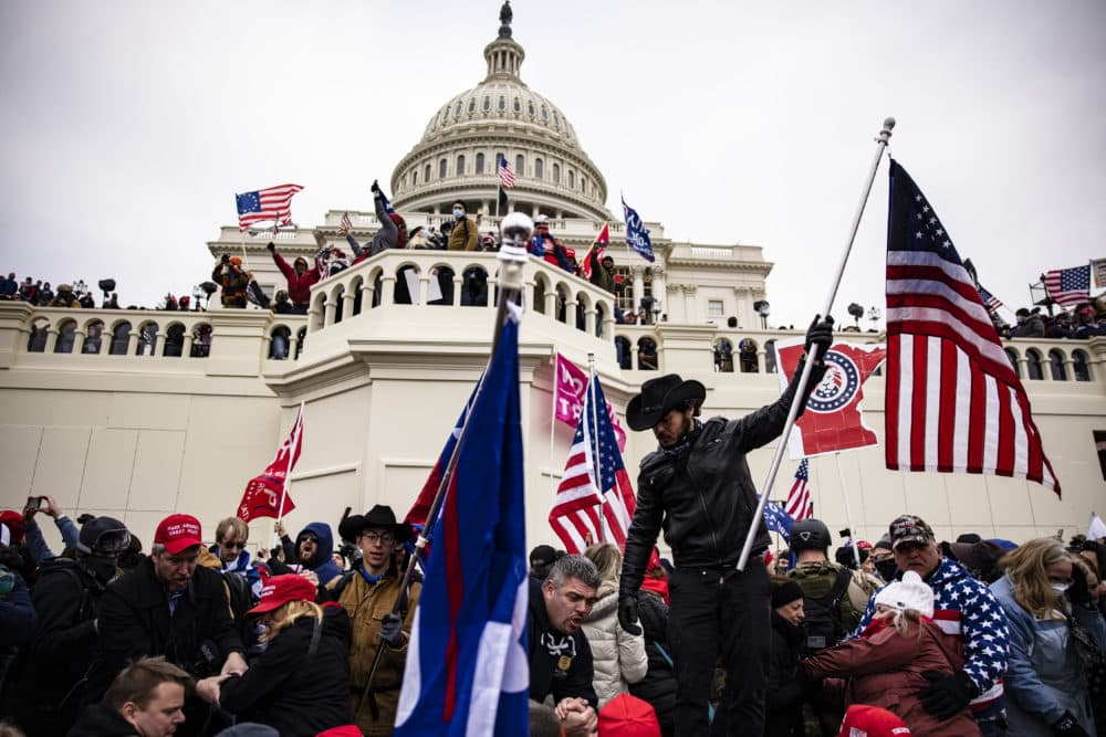 Pro-Trump supporters storm the U.S. Capitol following a rally with President Donald Trump on Jan. 6, 2021 in Washington, DC. Trump supporters gathered in the nation's capital today to protest the ratification of President-elect Joe Biden's Electoral College victory over President Trump in the 2020 election. (Samuel Corum/Getty Images)