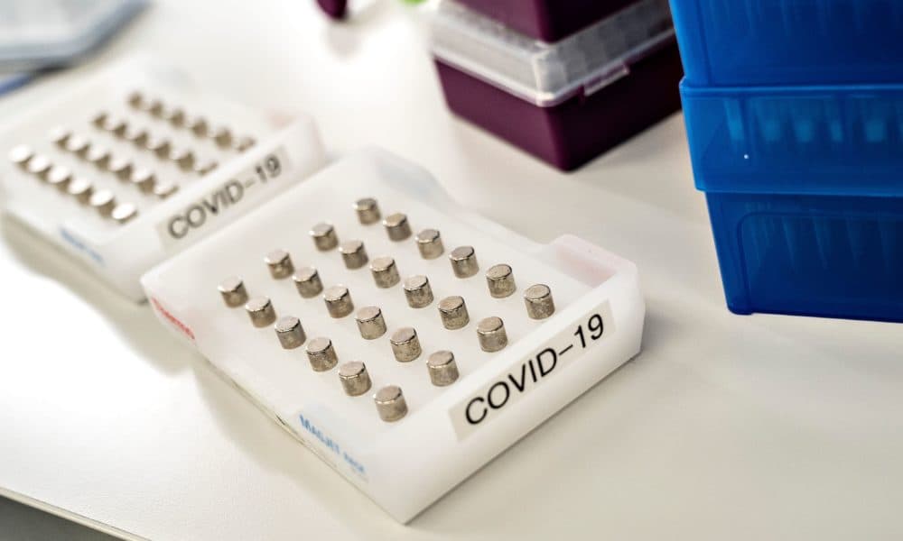 Palettes for test samples are pictured as researchers at Aalborg University screen and analyze all positive Danish coronavirus samples for the virus variant cluster B117 from the United Kingdom, in Aalborg, Denmark on Jan. 15, 2021, (Henning Bagger/Ritzau Scanpix/AFP via Getty Images)