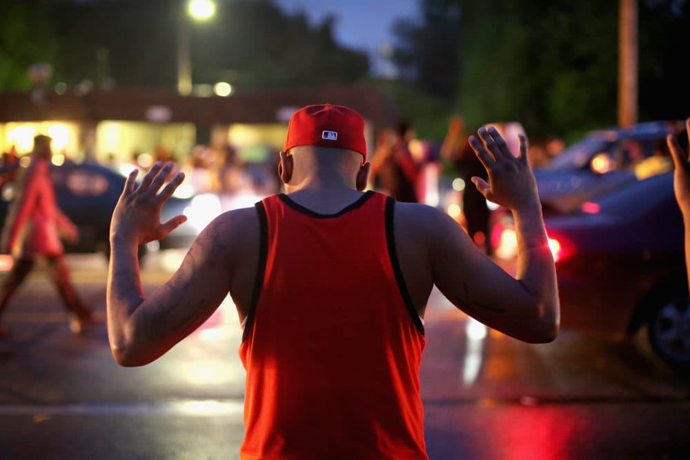 Demonstrators gather along West Florissant Avenue to protest the shooting of Michael Brown on Aug. 15, 2014 in Ferguson, Missouri. (Scott Olson/Getty Images)